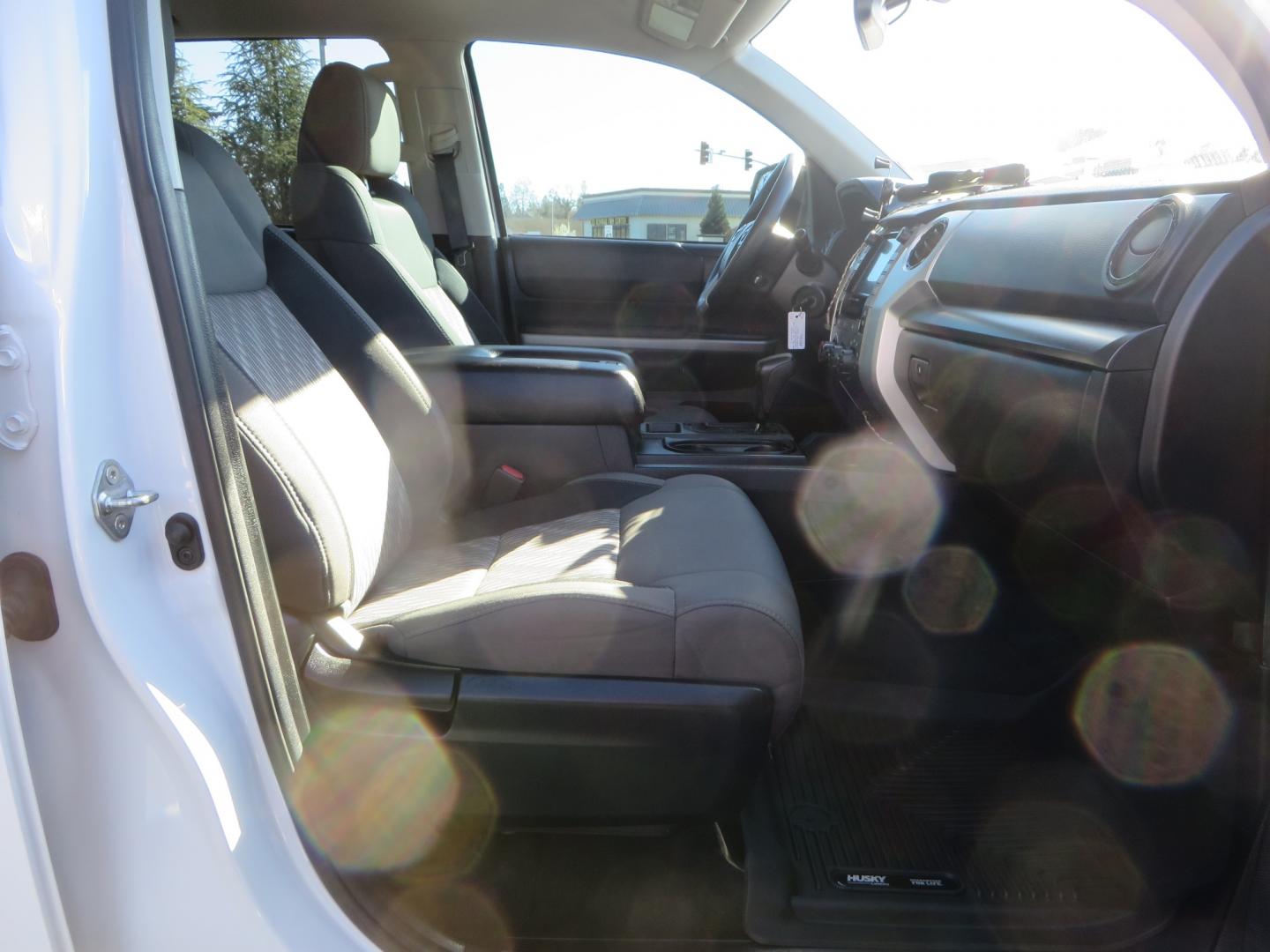 2020 White /GREY Toyota Tundra SR5 (5TFDY5F19LX) with an 5.7L engine, automatic transmission, located at 2630 Grass Valley Highway, Auburn, CA, 95603, (530) 508-5100, 38.937893, -121.095482 - Features - King Off Road adjustable remote reservoir coil overs, King 2.5 adjustable remote reservoir rear shocks, Method Race wheels, Falken Wildpeak tires, Sliders, Bed braces, Borla Exhaust, Husky floor mats, Window tint, and Ram phone mounts. - Photo#43